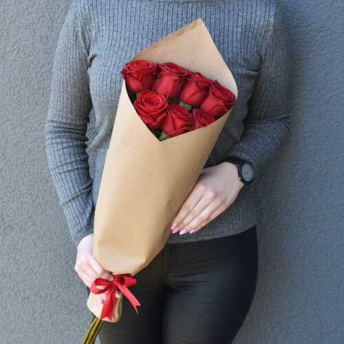 A bouquet of red roses for a girl